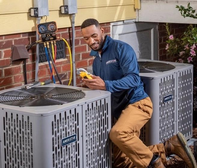 HVAC Unit with modern house in background