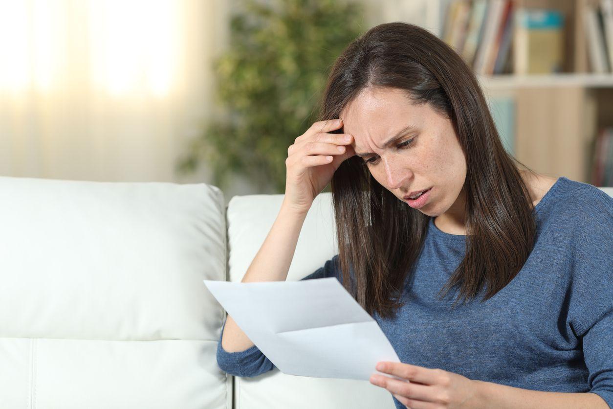 Woman reviewing bill