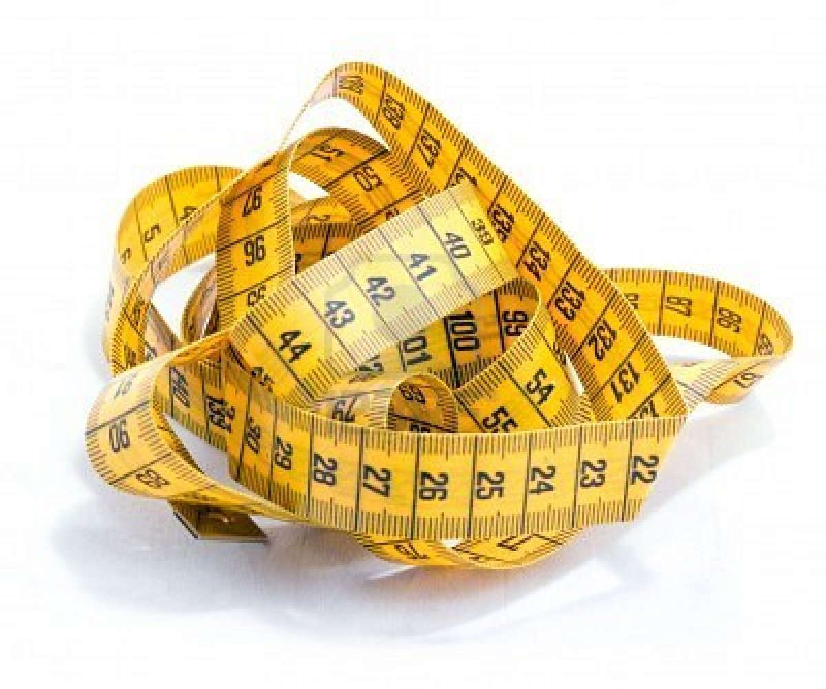 5254017-tangled-tape-measure-against-a-white-background