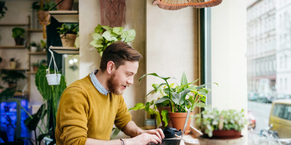 person on laptop typing