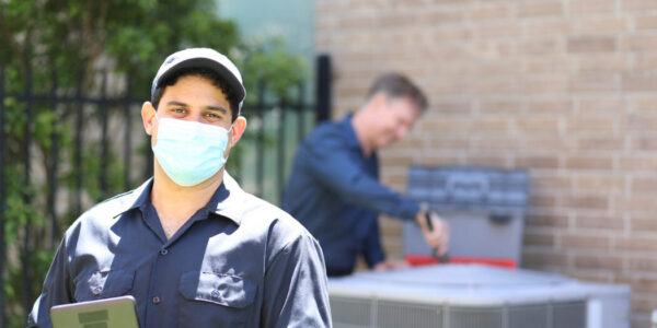 Techs complete air conditioner inspection