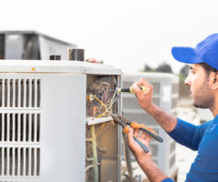  Man using blue repair work Air Conditioner system