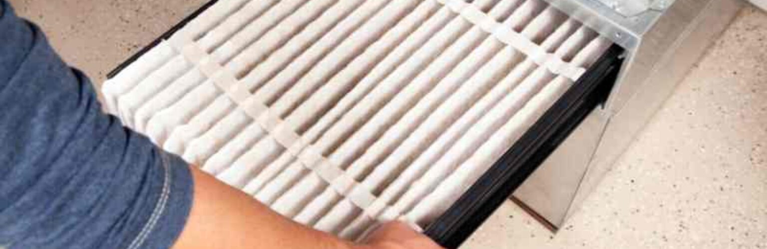 man fixing furnace