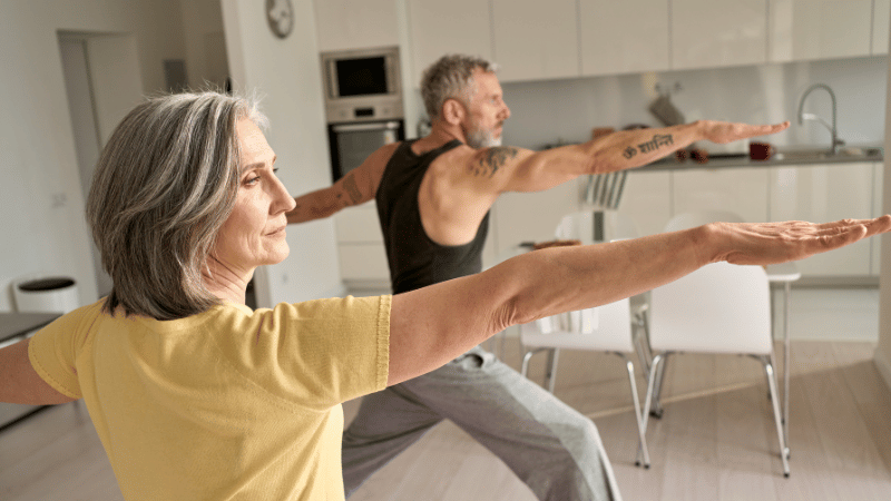 people doing yoga in kitchen