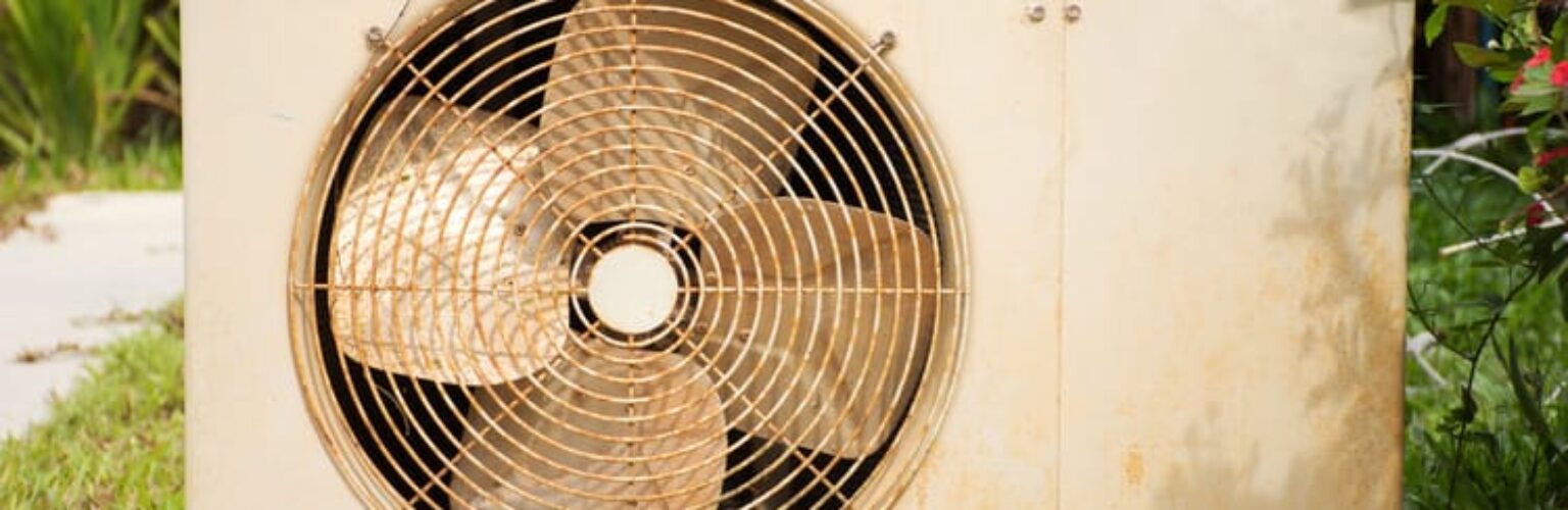 broken and rusty air conditioner