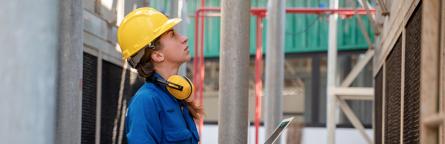woman-inspecting-ac