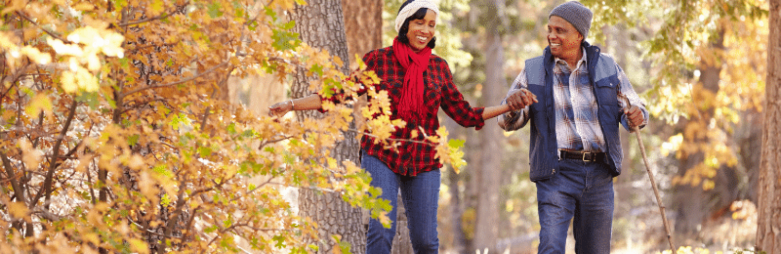 couple walking in woods